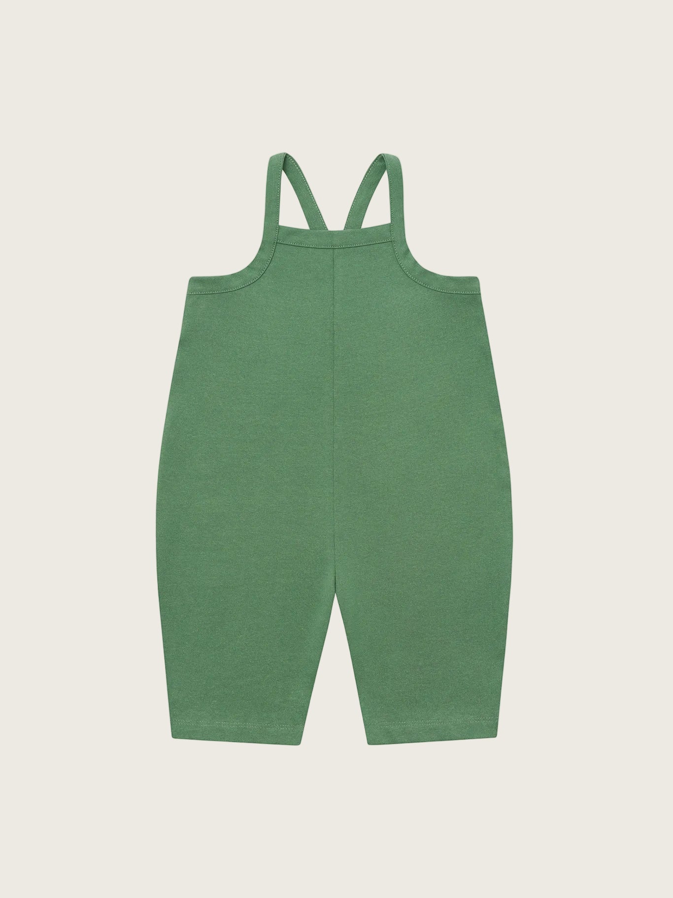 Green dungarees on a white background