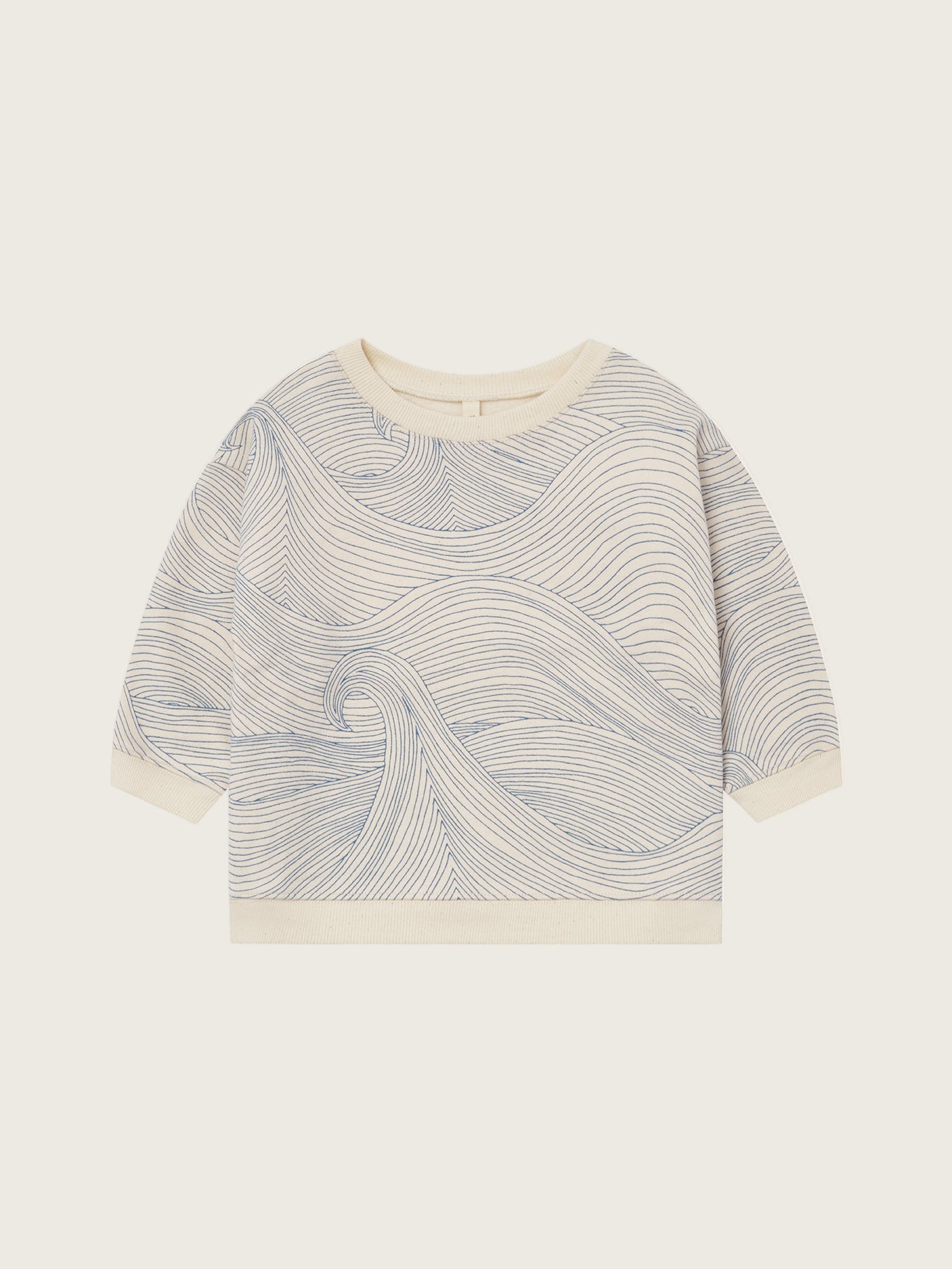 toddler cream undyed cotton sweatshirt with Seascape design of flowing blue line-drawn ocean waves