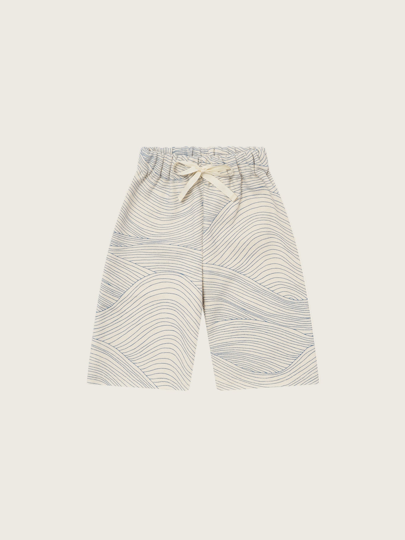 baby and toddler cream undyed cotton wide leg drawstring pants with blue line-drawn ocean waves