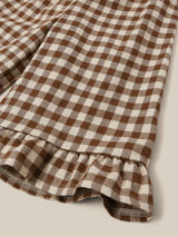 close up of brown and white checkered gingham culottes with frill hems