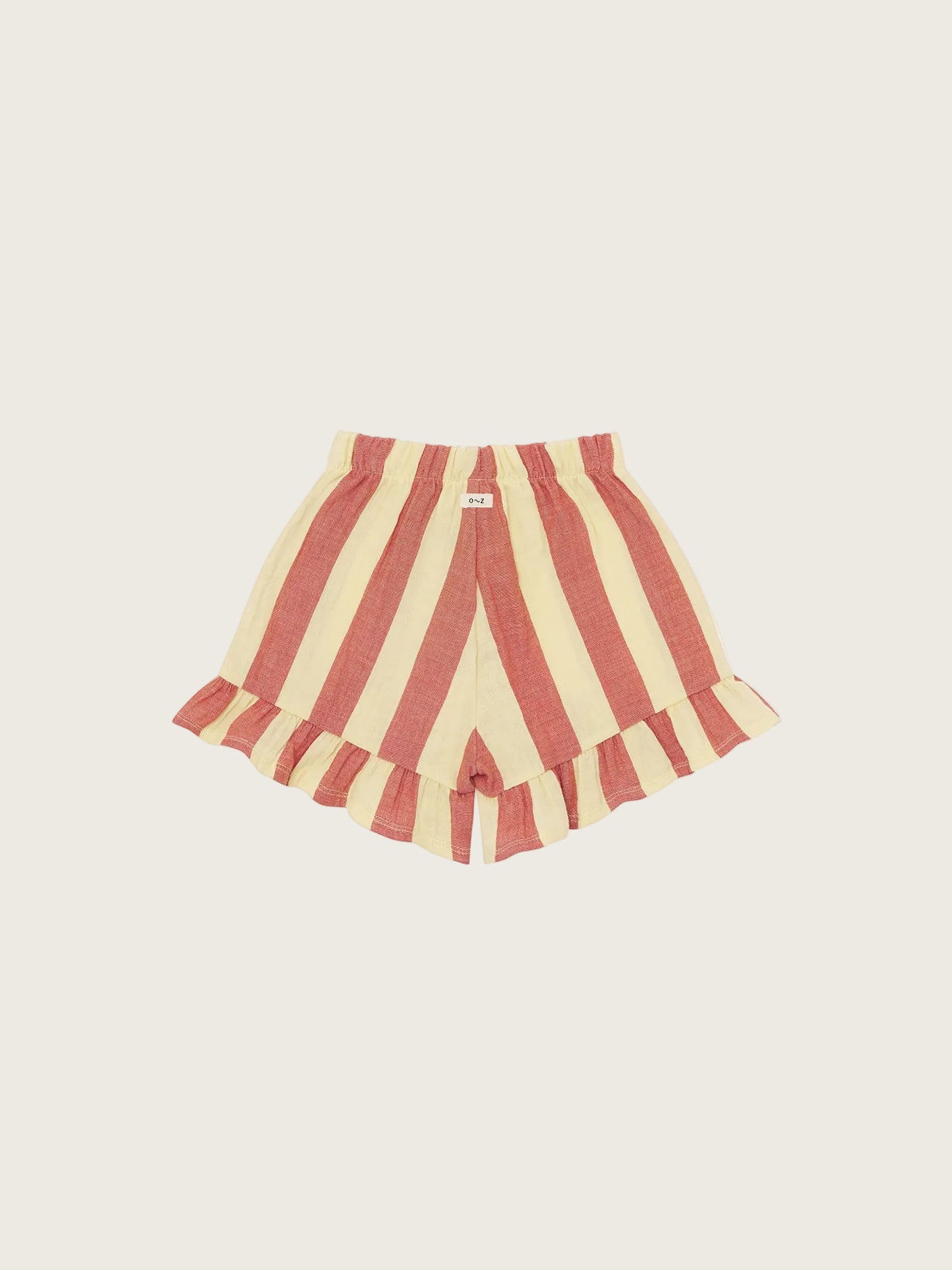 Red and beige striped shorts with ruffled hem on a white background